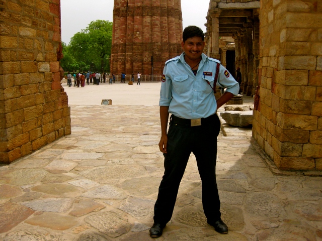 Our security guard friend at the Qutb Minar.