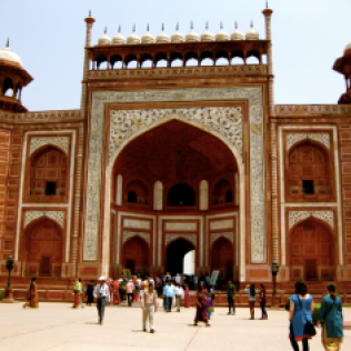 The red sandstone entry gate to the Taj grounds.